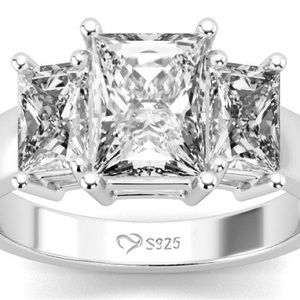 Stunning three Stone Sterling Silver engagement ring.